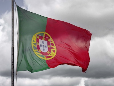 portuguese flag flying in the wind